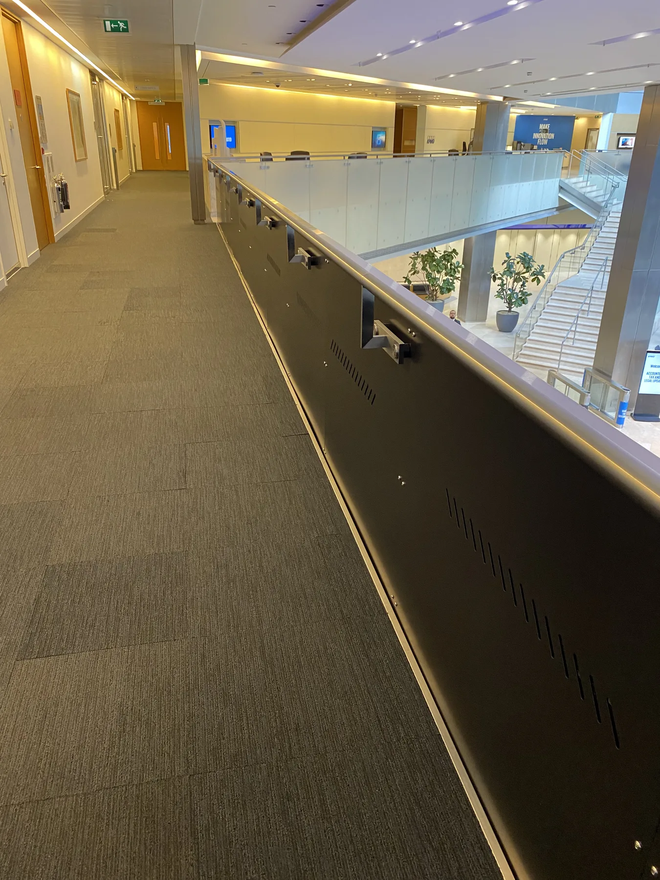 KPMG — mezzanine balustrade run installed in situ across the office floor