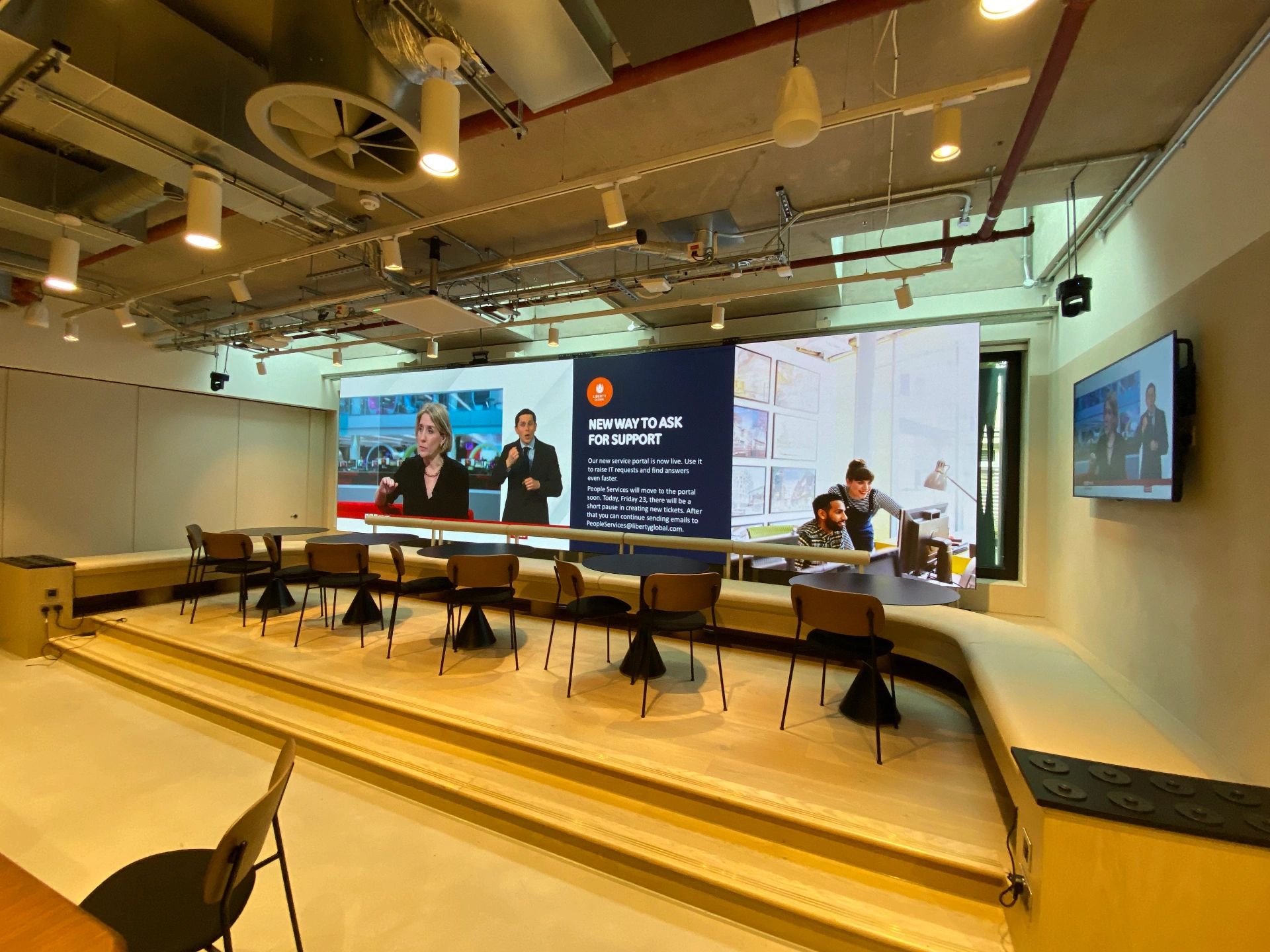 Liberty Global — commissioned LED feature wall in auditorium displaying internal communications