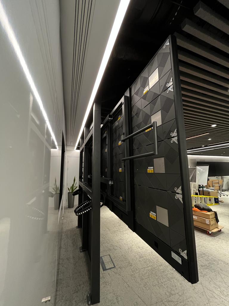 Mastercard — rear of LED panel array showing module structure and corridor mounting