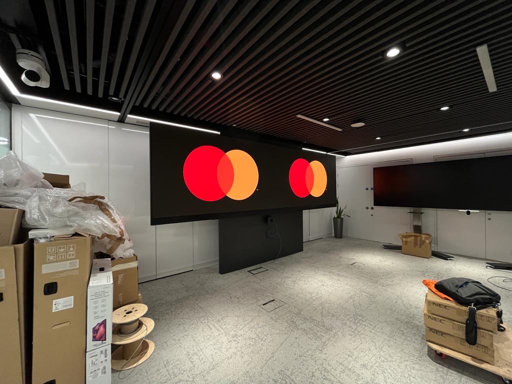 Mastercard — angled view of paired LED brand walls during commissioning