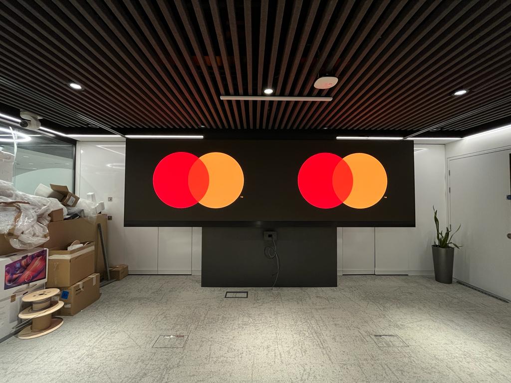 Mastercard — paired LED brand walls displaying the iconic interlocking circles, front elevation