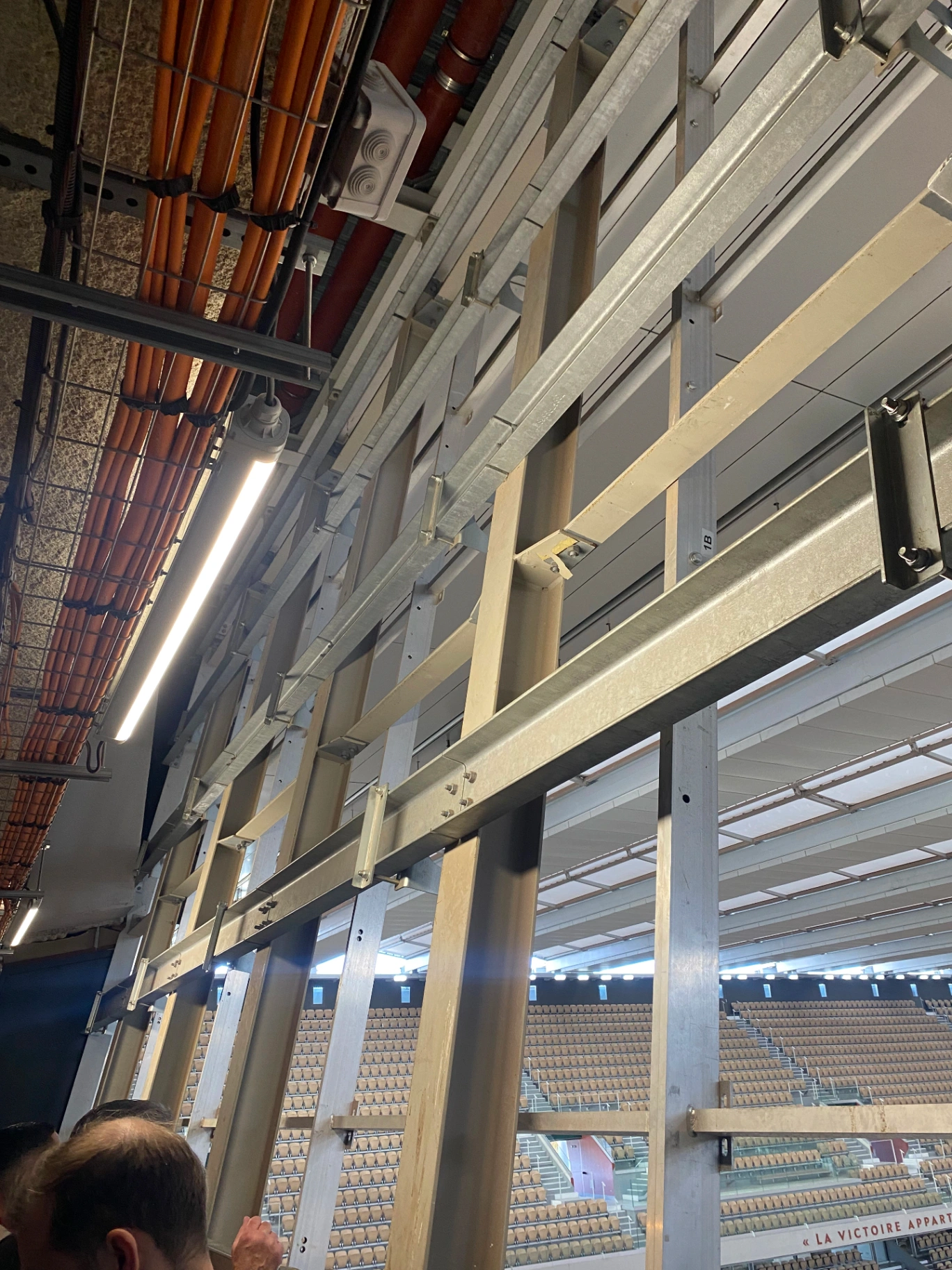 Roland Garros — galvanised steel rigging members and bracket detail above seating bowl