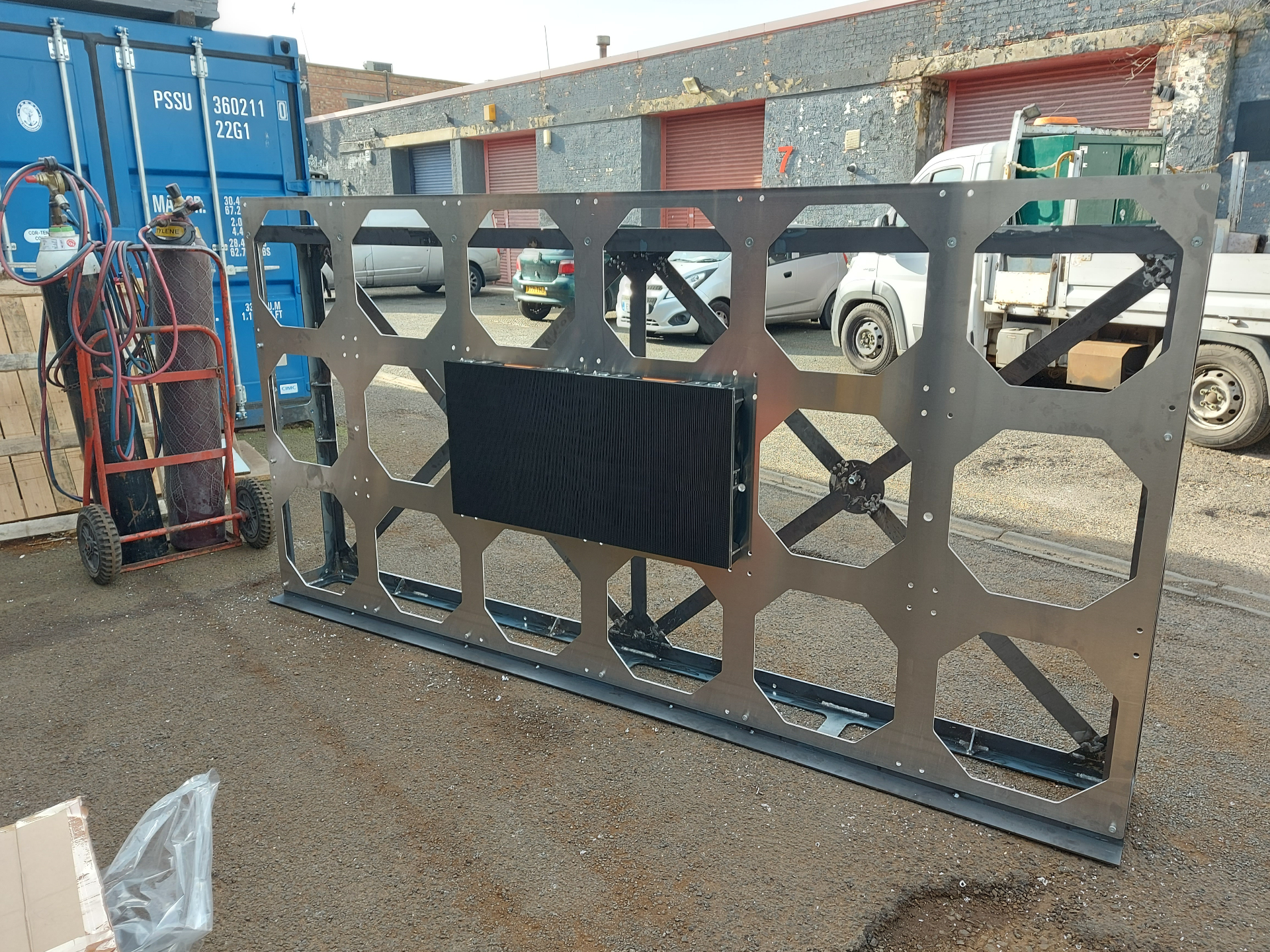 St Pancras — bespoke fabricated structural frame for PID display, workshop yard